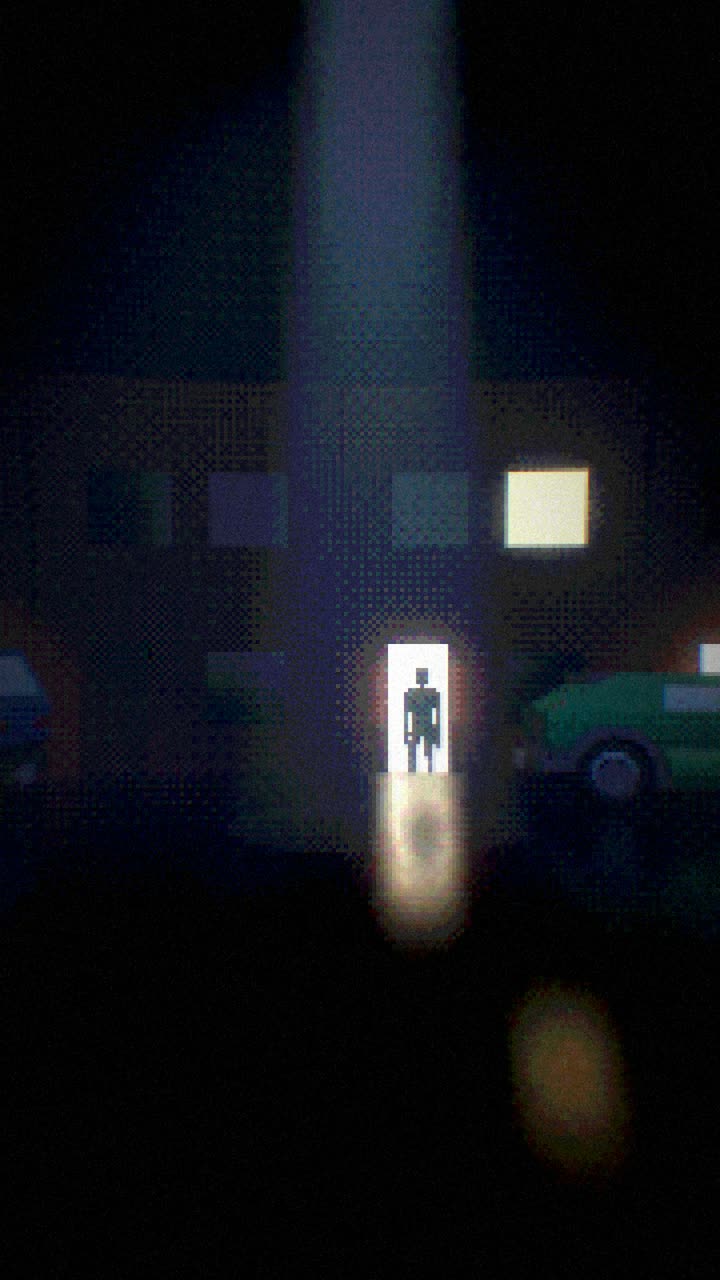 A lone figure in a lit doorway on a dark street